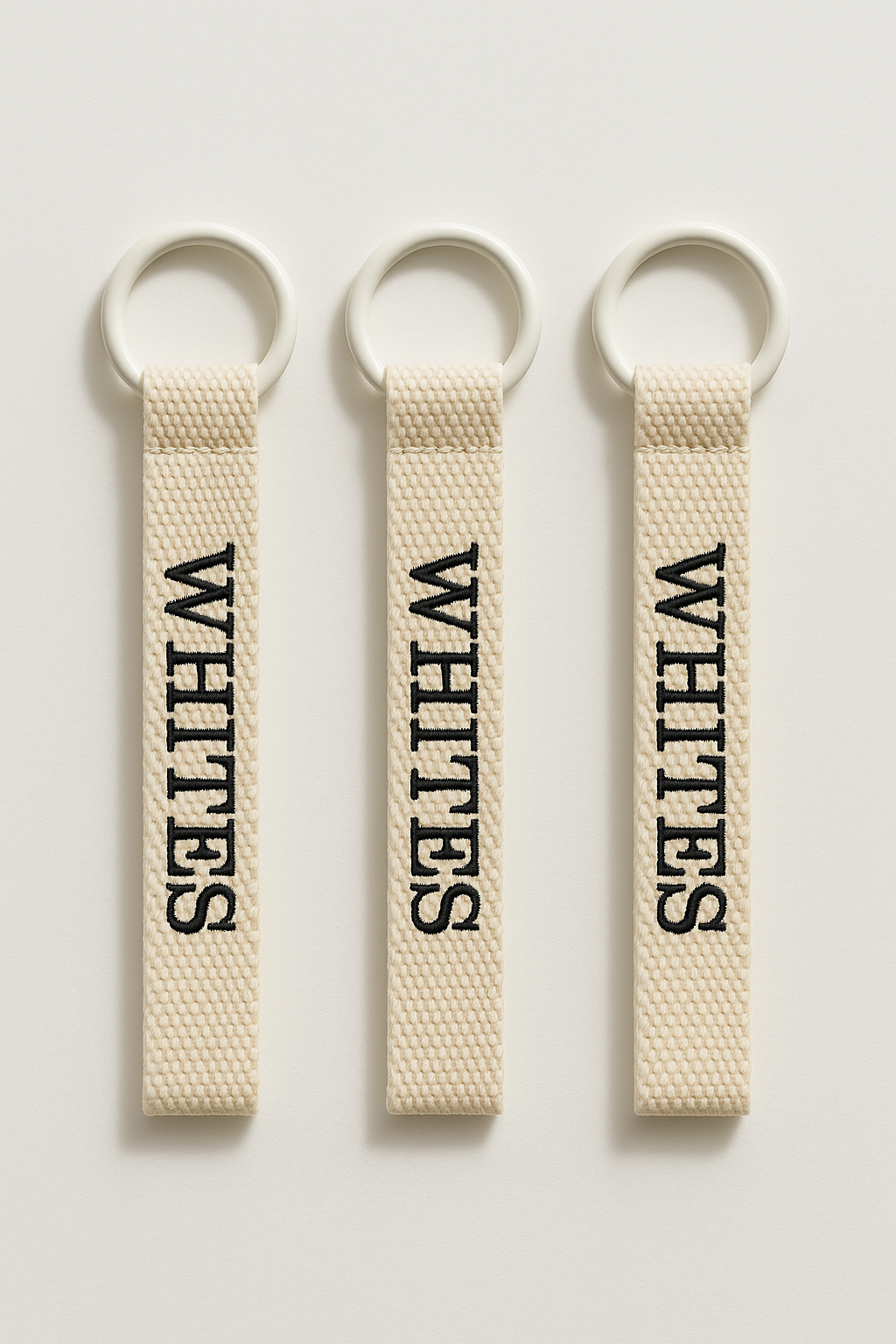 Custom Embroidered Name Tag – Black & White Keychain